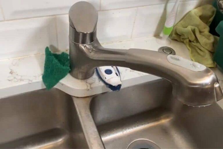 removing old faucet from kitchen sink