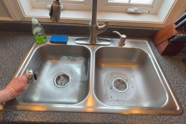 kitchen sink drains into yard