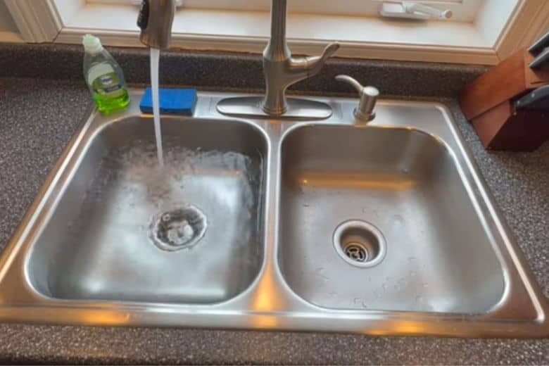 how to fix airlock in kitchen sink drain